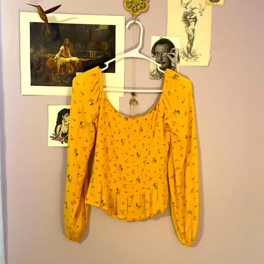 Long sleeve, over the shoulder, ruffled stretchy top